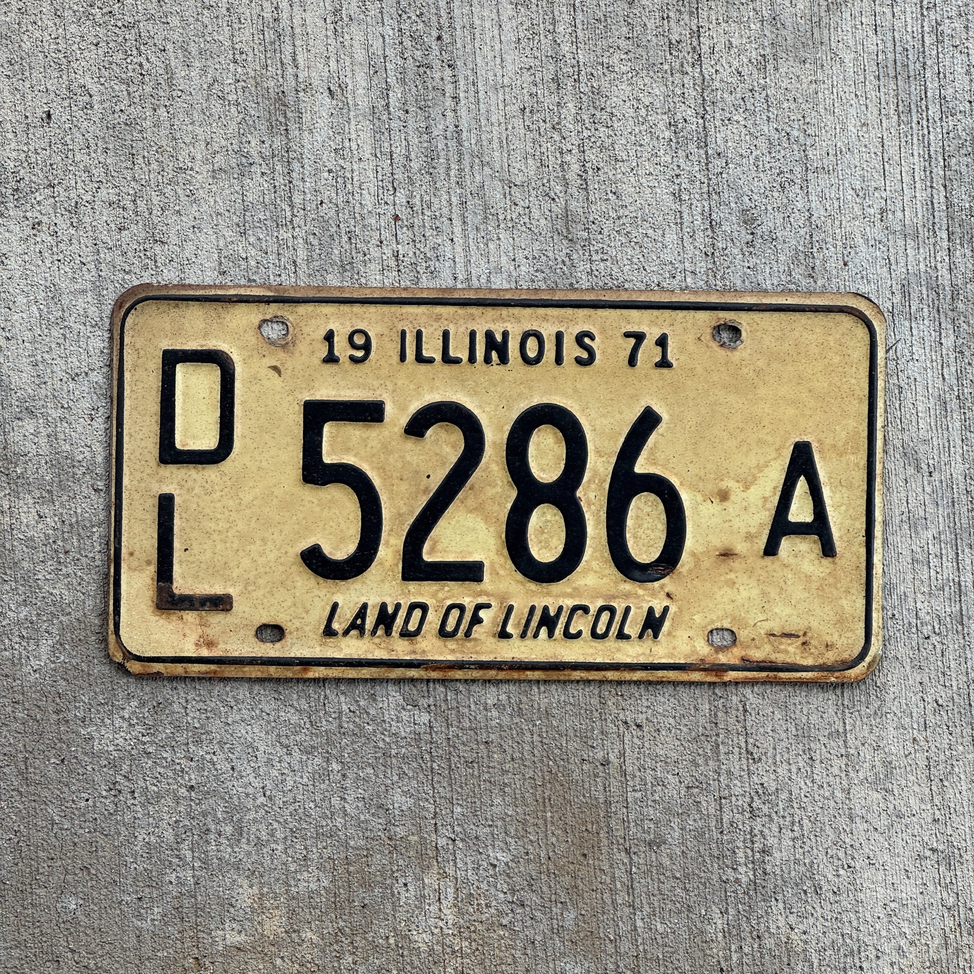 Photo of a 1971 Illinois Dealer License Plate Auto Tag 1 Vintage Garage 5286 A with original patina