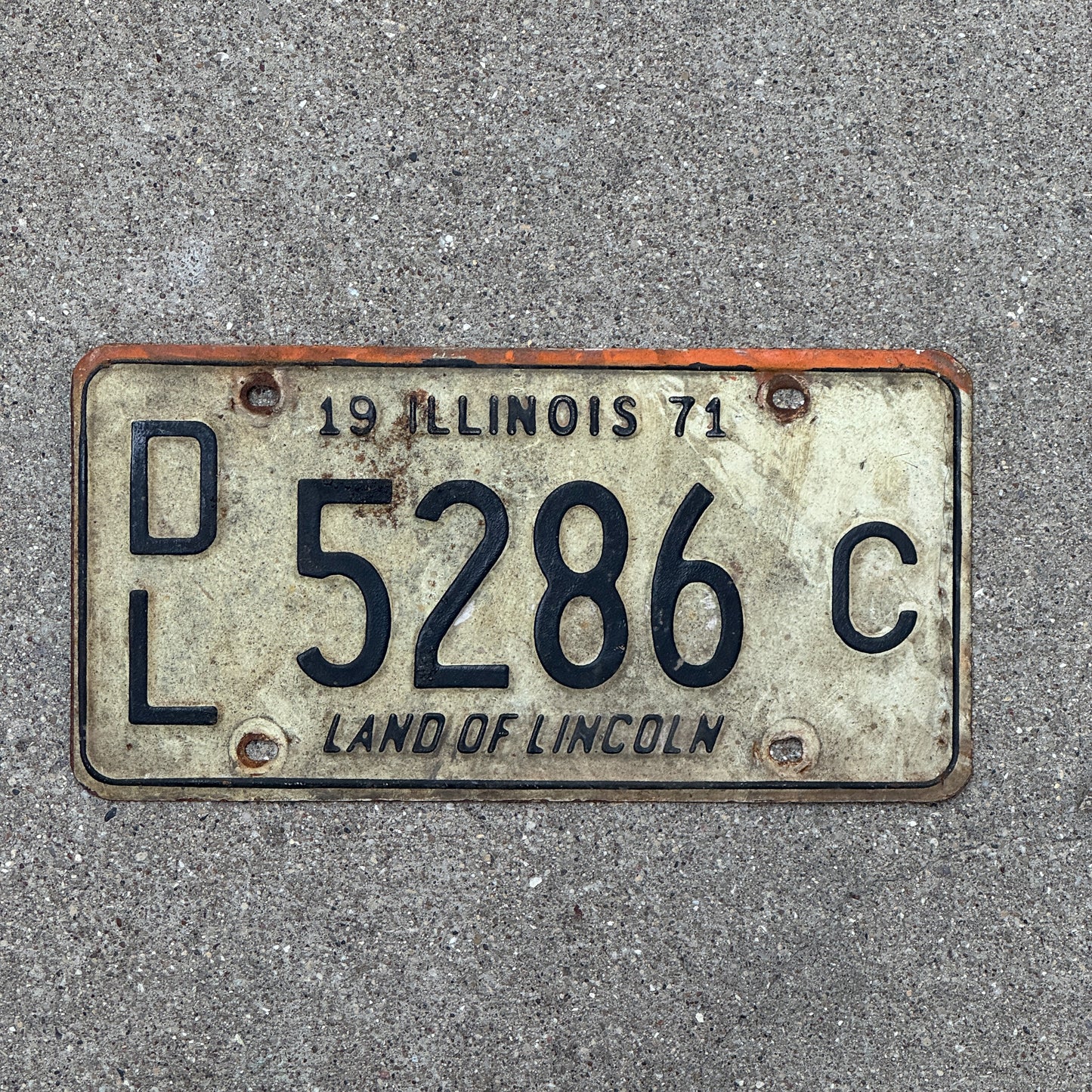 Photo of a 1971 Illinois Dealer License Plate Auto Tag 1 Vintage Garage 5286 C with original patina