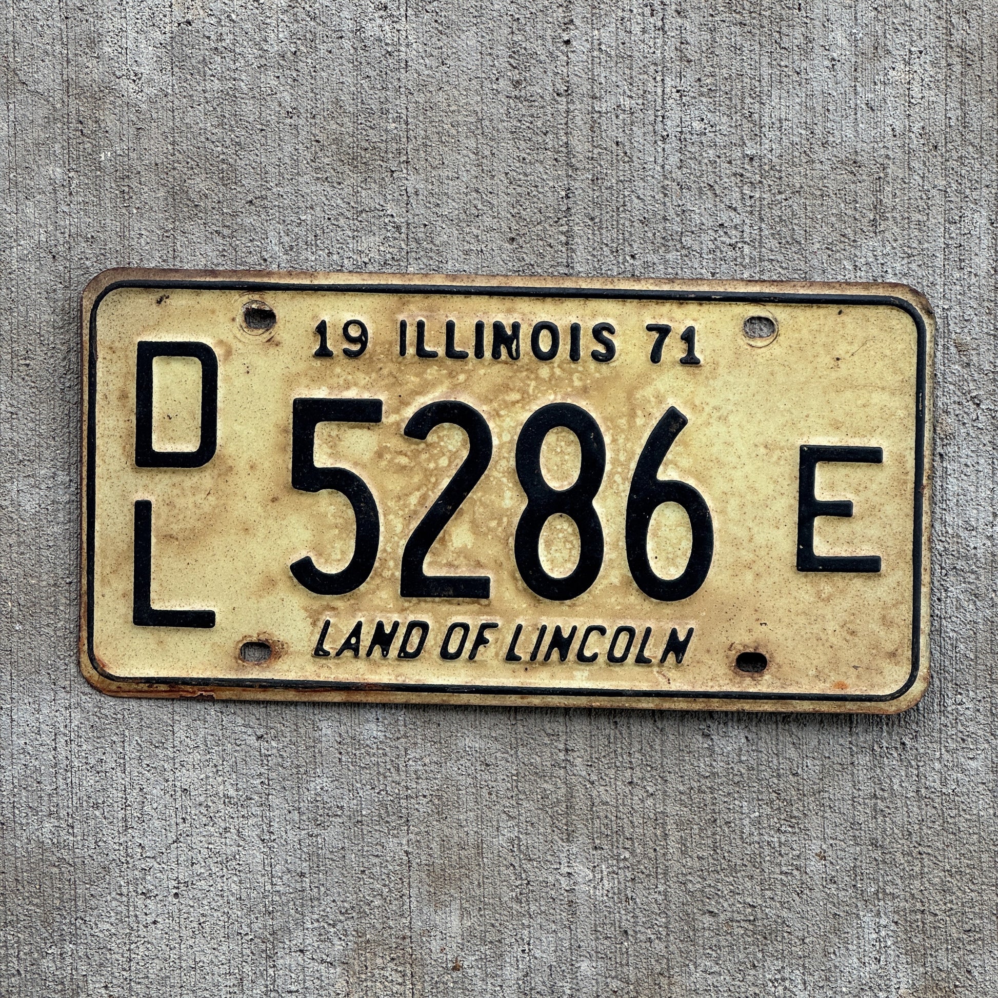 Photo of a 1971 Illinois Dealer License Plate Auto Tag 2 Vintage Garage 5286 E with original patina