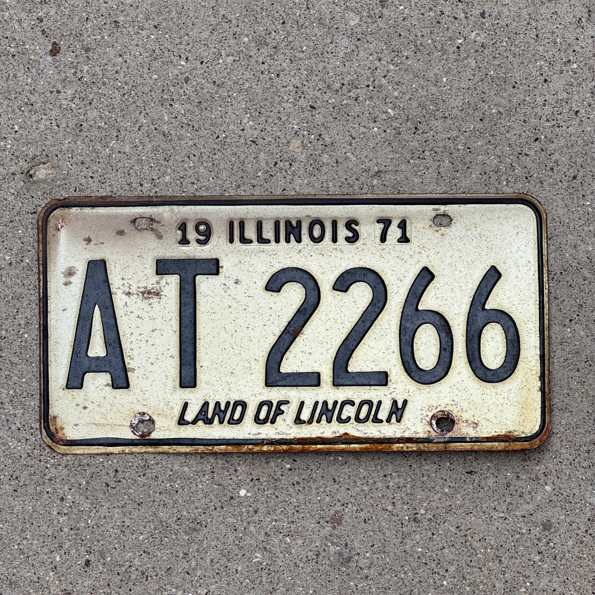 Photo of a 1971 Illinois License Plate Auto Tag 1 Vintage Garage AT 2266 with original patina