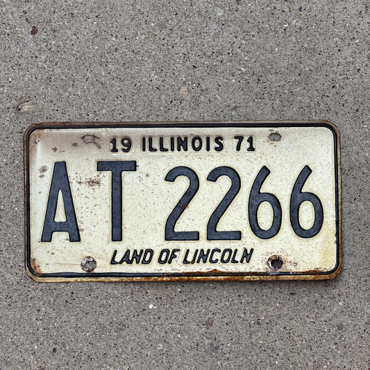 Photo of a 1971 Illinois License Plate Auto Tag 1 Vintage Garage AT 2266 with original patina