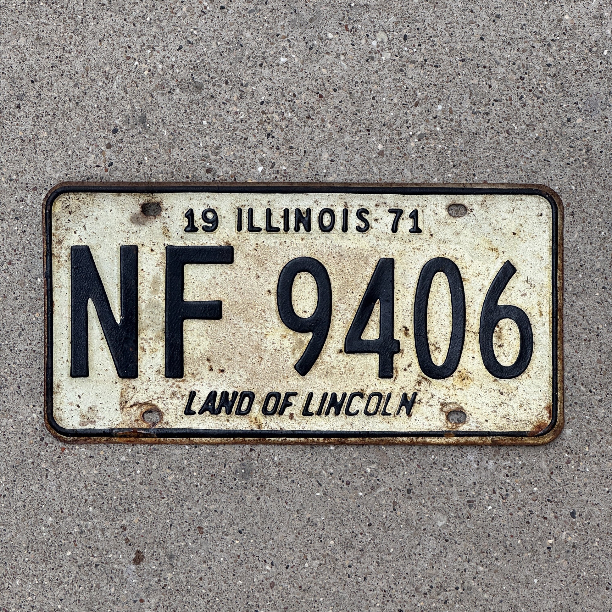 Photo of a 1971 Illinois License Plate Auto Tag 1 Vintage Garage NF 9406 with original patina
