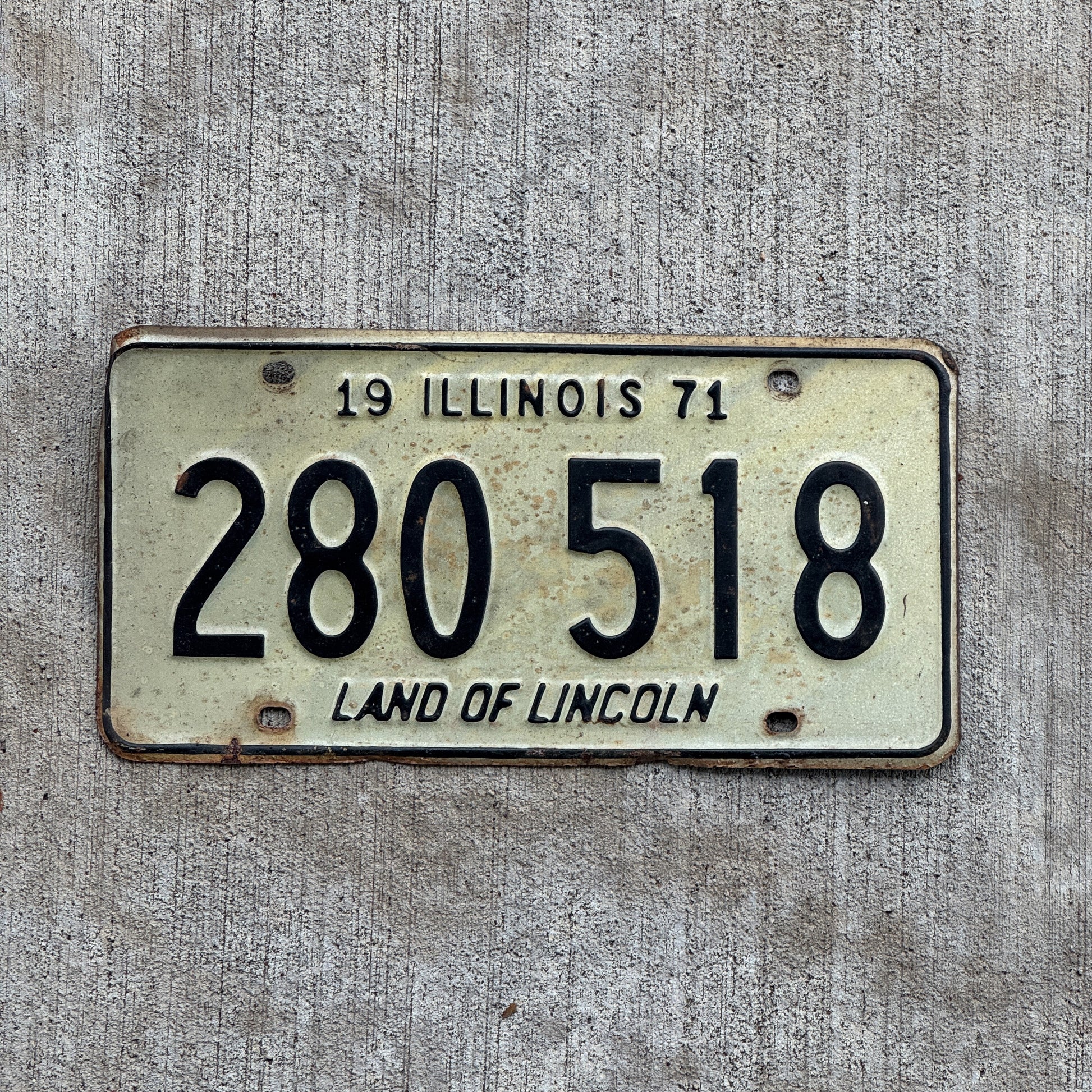 Photo of a 1971 Illinois License Plate Auto Tag 2 Vintage Garage 280 518 with original patina