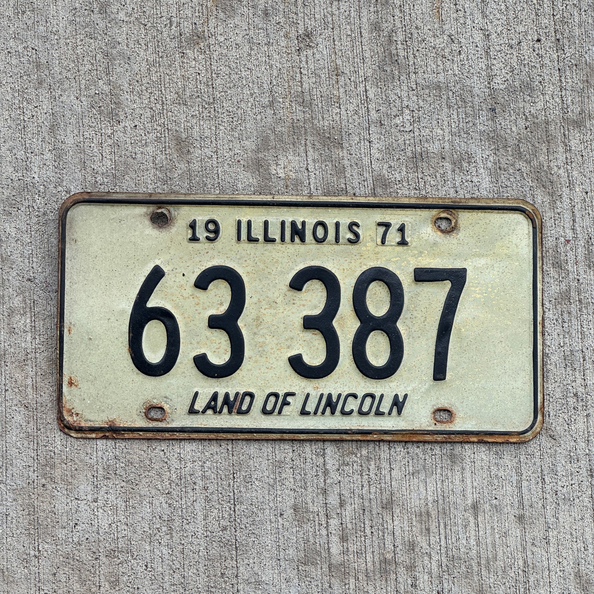 Photo of a 1971 Illinois License Plate Auto Tag 2 Vintage Garage 63 387 with original patina