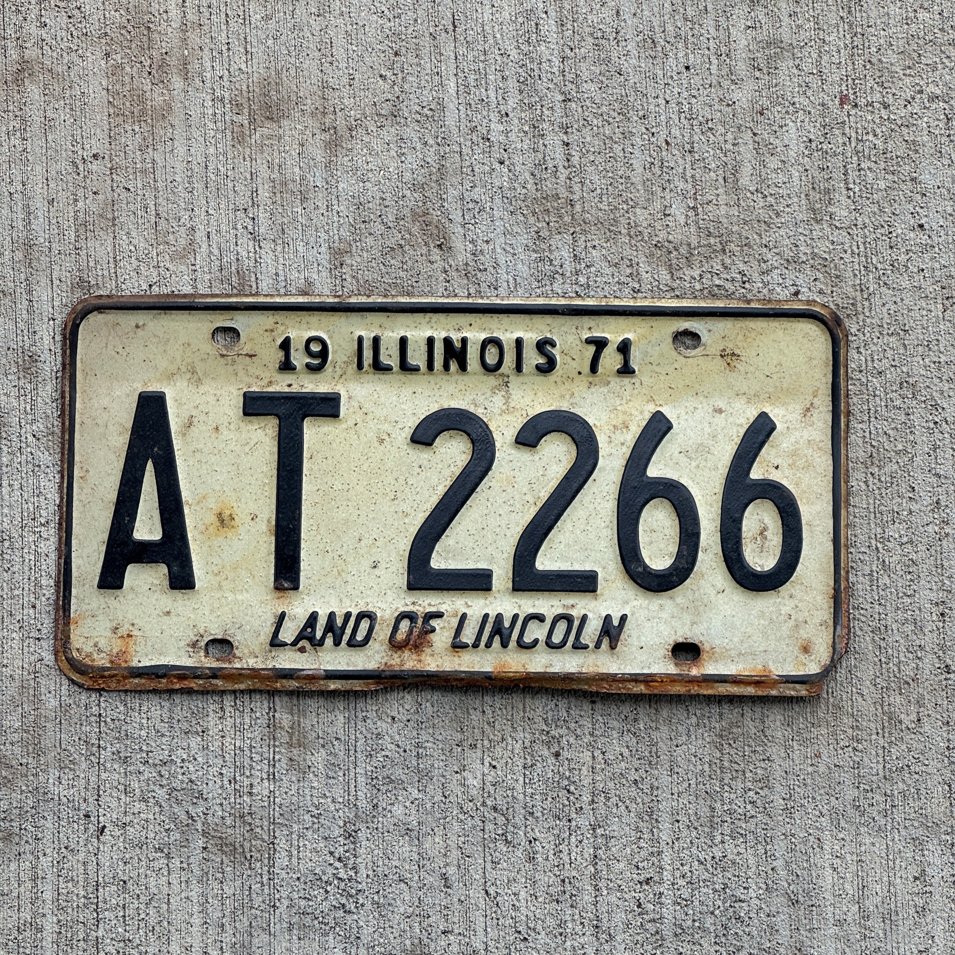 Photo of a 1971 Illinois License Plate Auto Tag 2 Vintage Garage AT 2266 with original patina