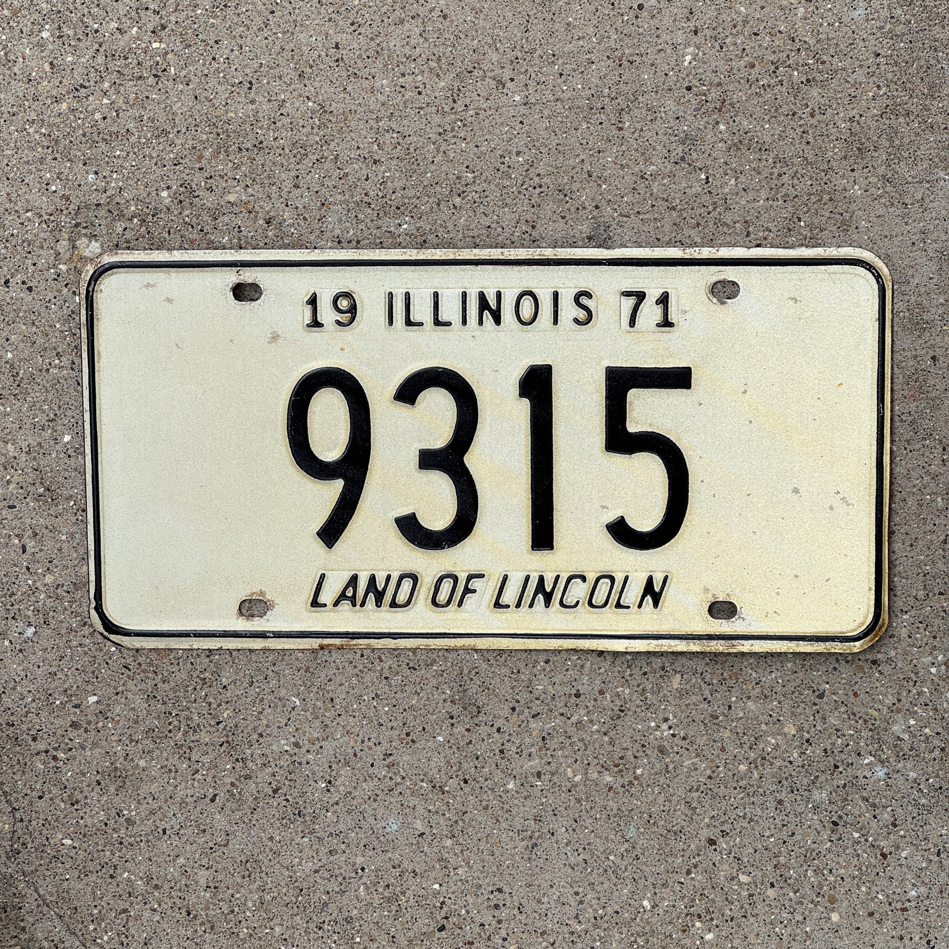 Photo of a 1971 Illinois License Plate Auto Tag Garage Decor Vintage Low Number Four Digit 9315 with original patina