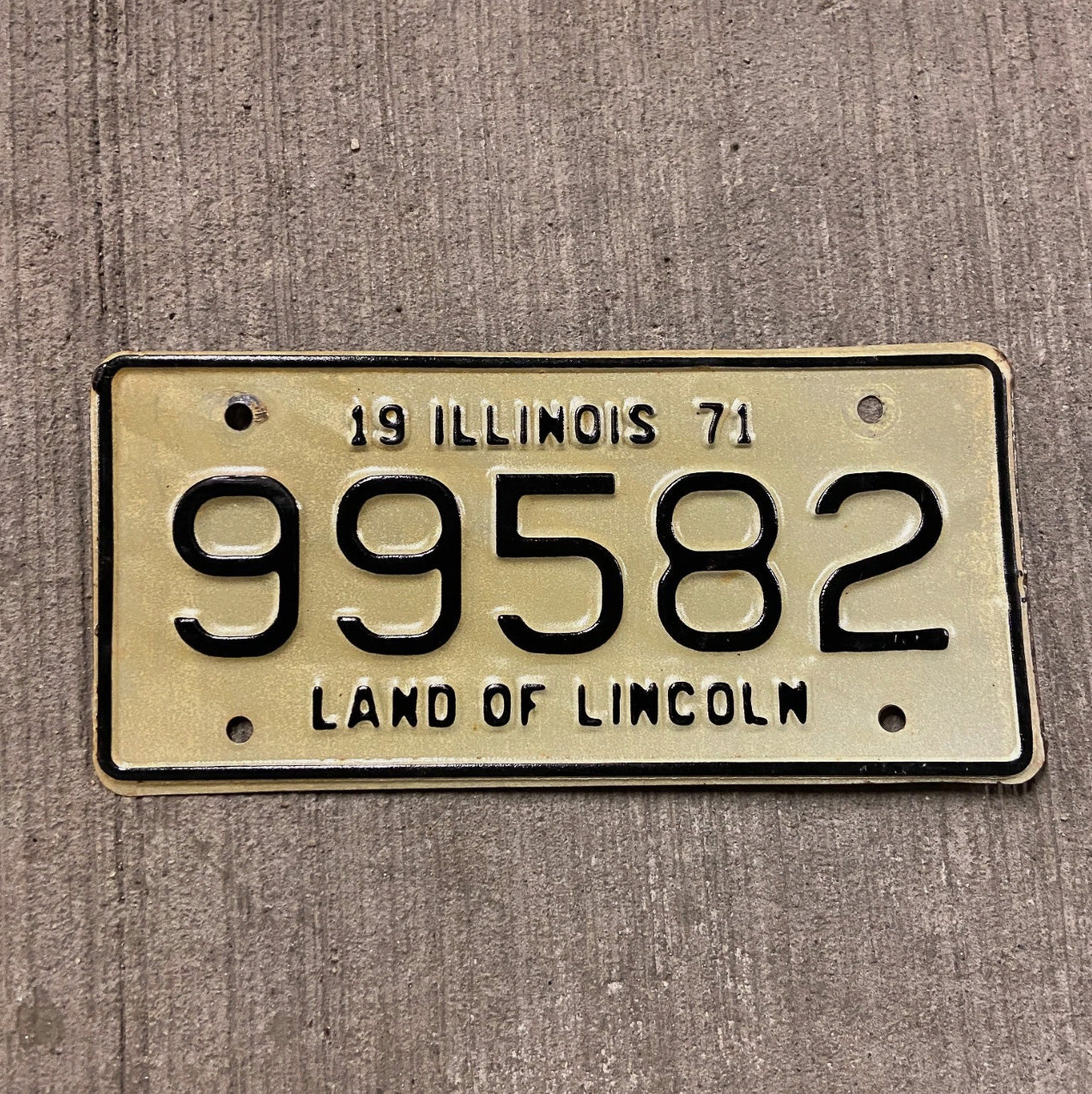 Photo of a 1971 Illinois Motorcycle License Plate Auto Tag Garage Decor Vintage 99582 with original patina