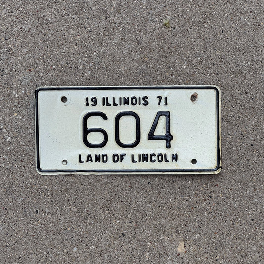 Photo of a 1971 Illinois Motorcycle License Plate Auto Tag Garage Decor Vintage Low Number Three Digit 604 with original patina