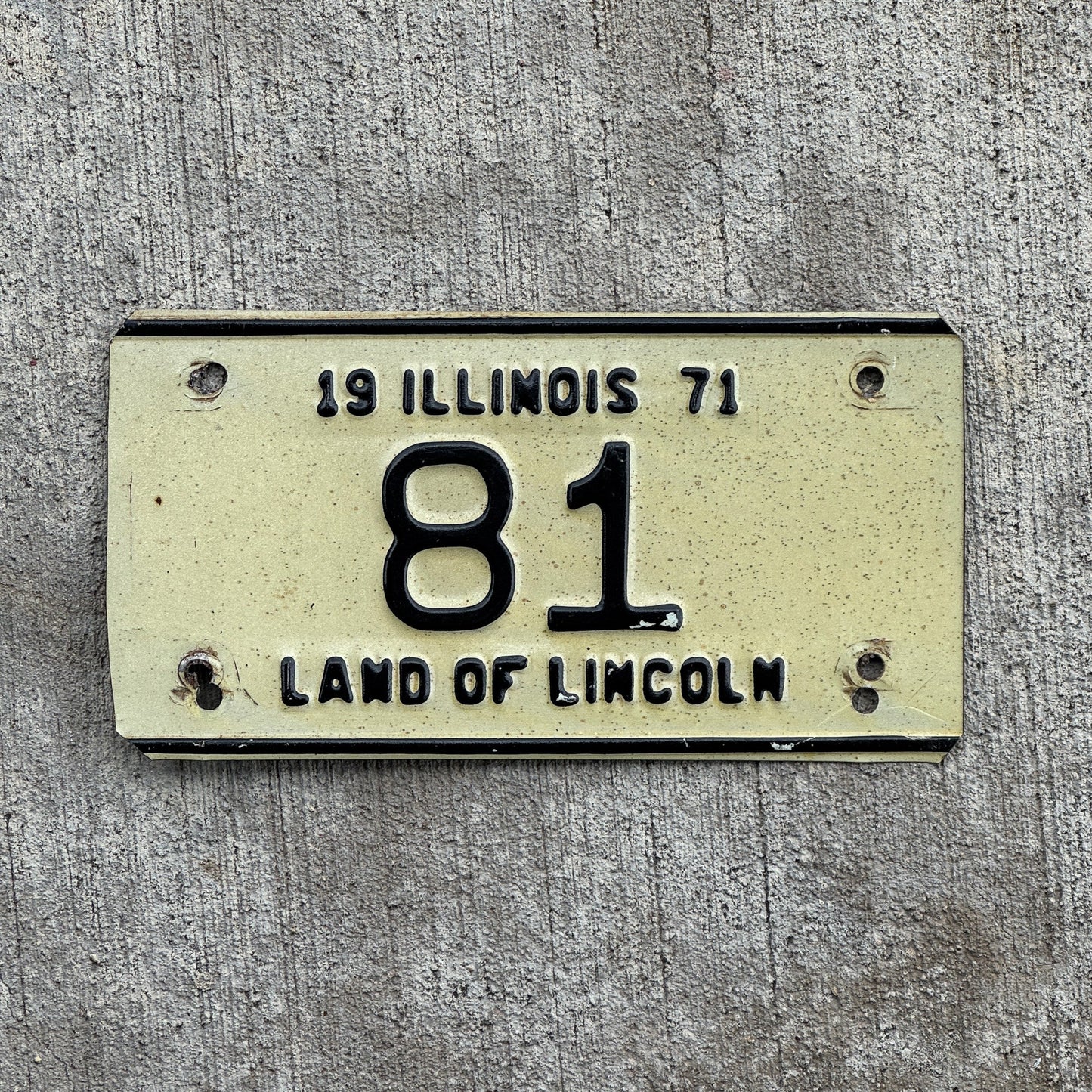 Photo of a 1971 Illinois Motorcycle License Plate Auto Tag Garage Decor Vintage Low Number Two Digit 81 with original patina