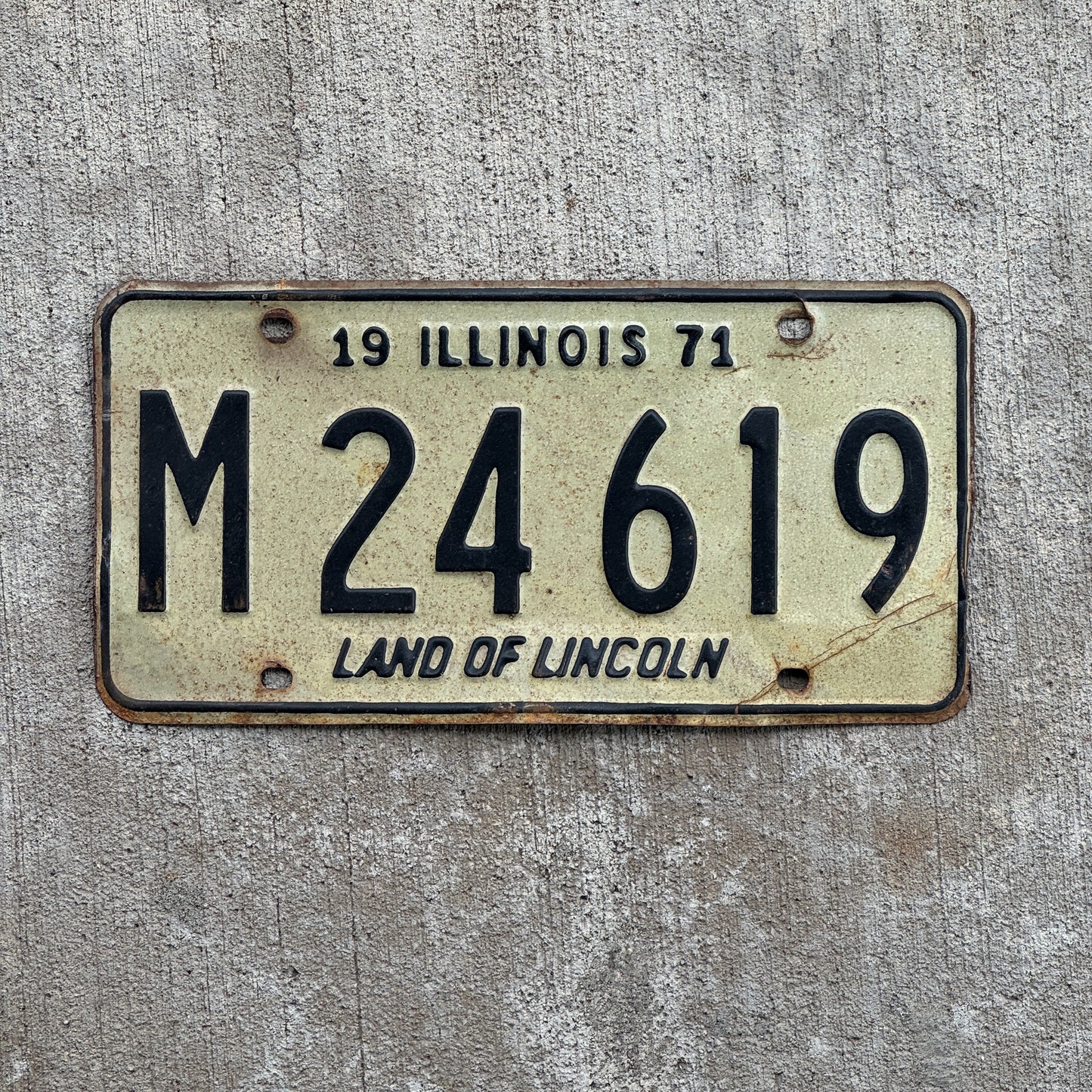 Photo of a 1971 Illinois Municipal License Plate Auto Tag 1 Vintage Garage M 24 619 with original patina
