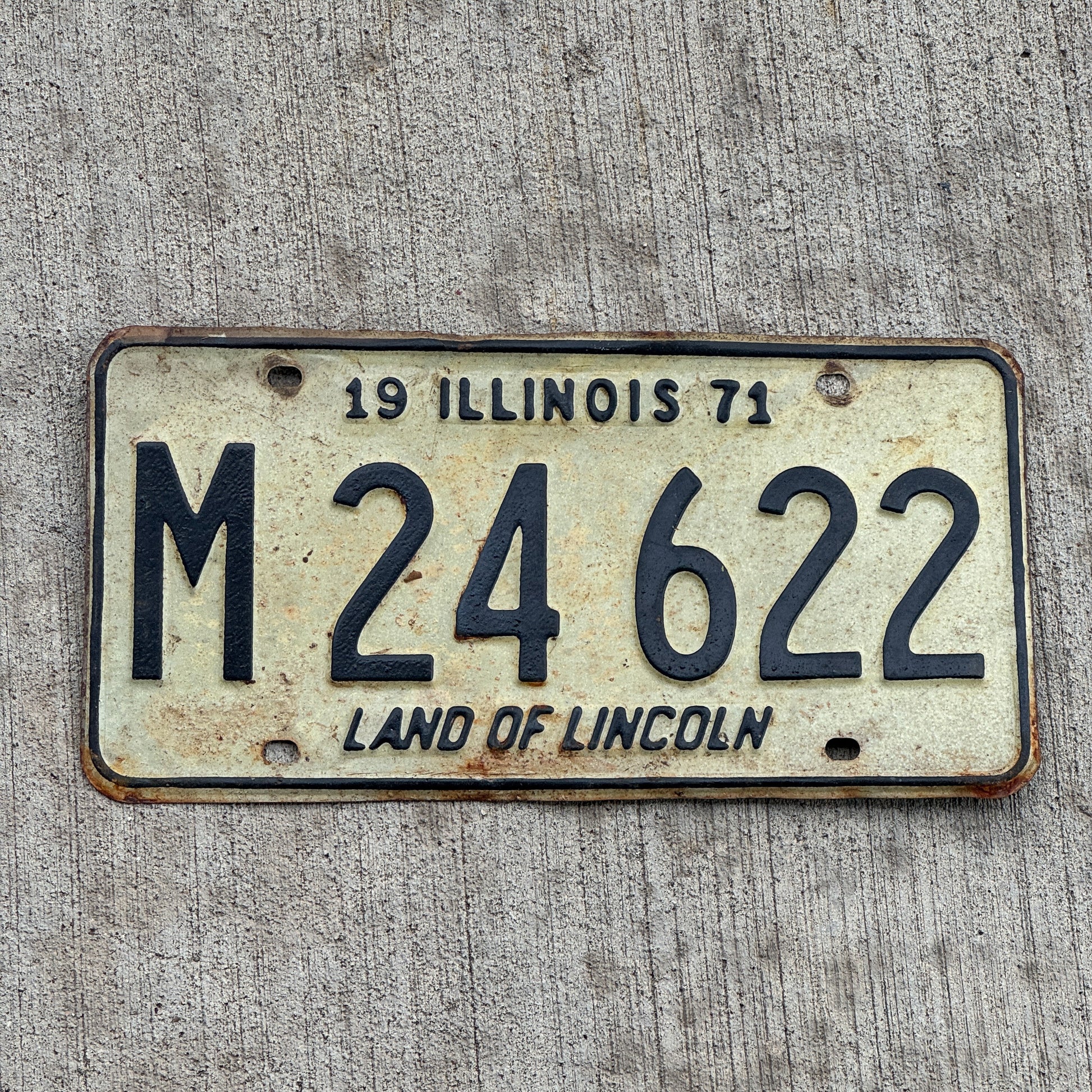 Photo of a 1971 Illinois Municipal License Plate Auto Tag 1 Vintage Garage M 24 622 with original patina
