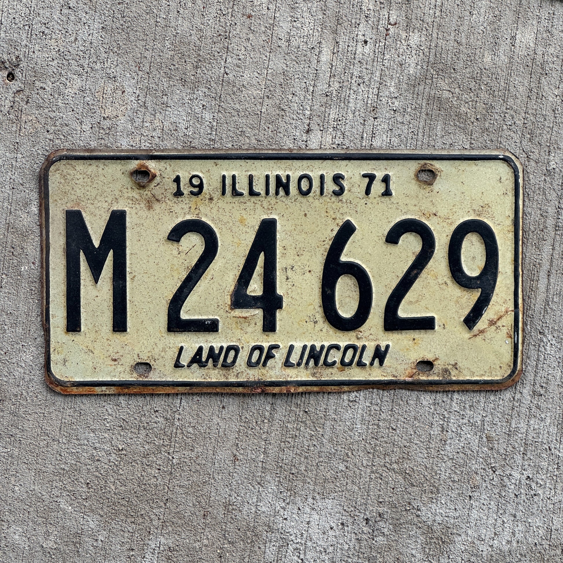 Photo of a 1971 Illinois Municipal License Plate Auto Tag 1 Vintage Garage M 24 629 with original patina