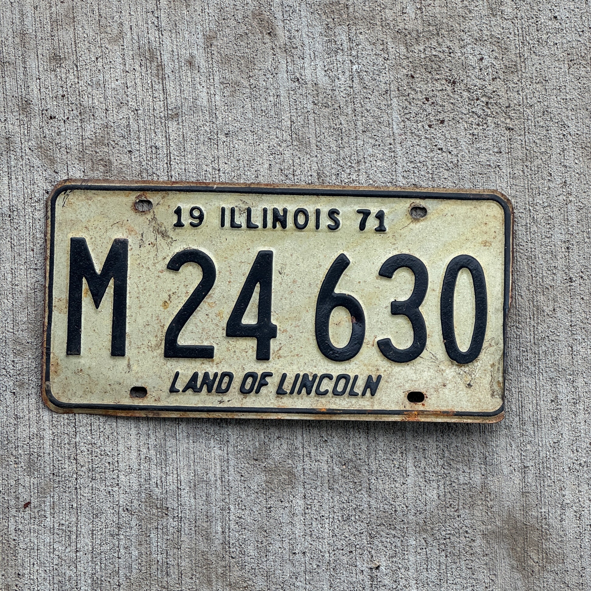 Photo of a 1971 Illinois Municipal License Plate Auto Tag 1 Vintage Garage M 24 630 with original patina