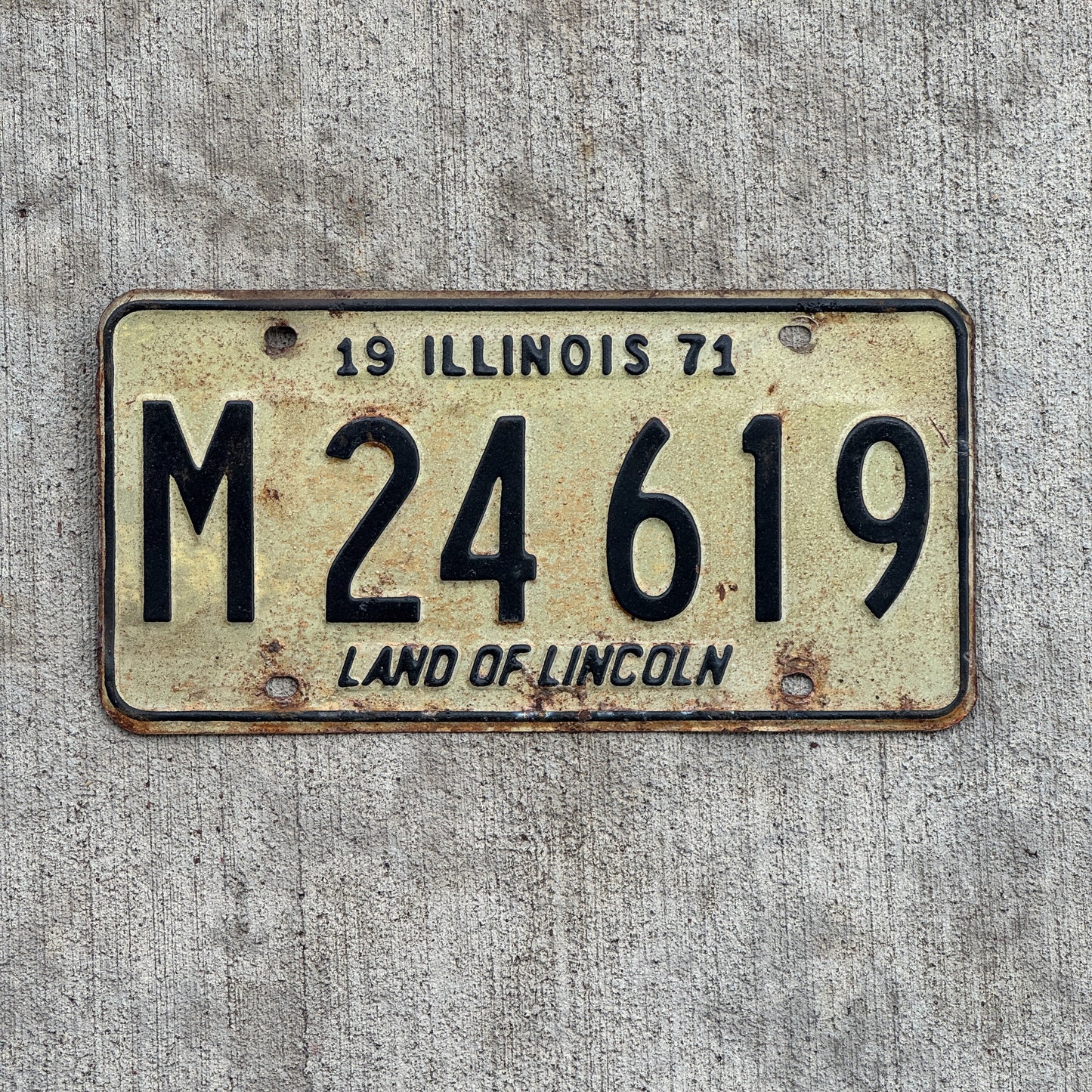 Photo of a 1971 Illinois Municipal License Plate Auto Tag 2 Vintage Garage M 24 619 with original patina