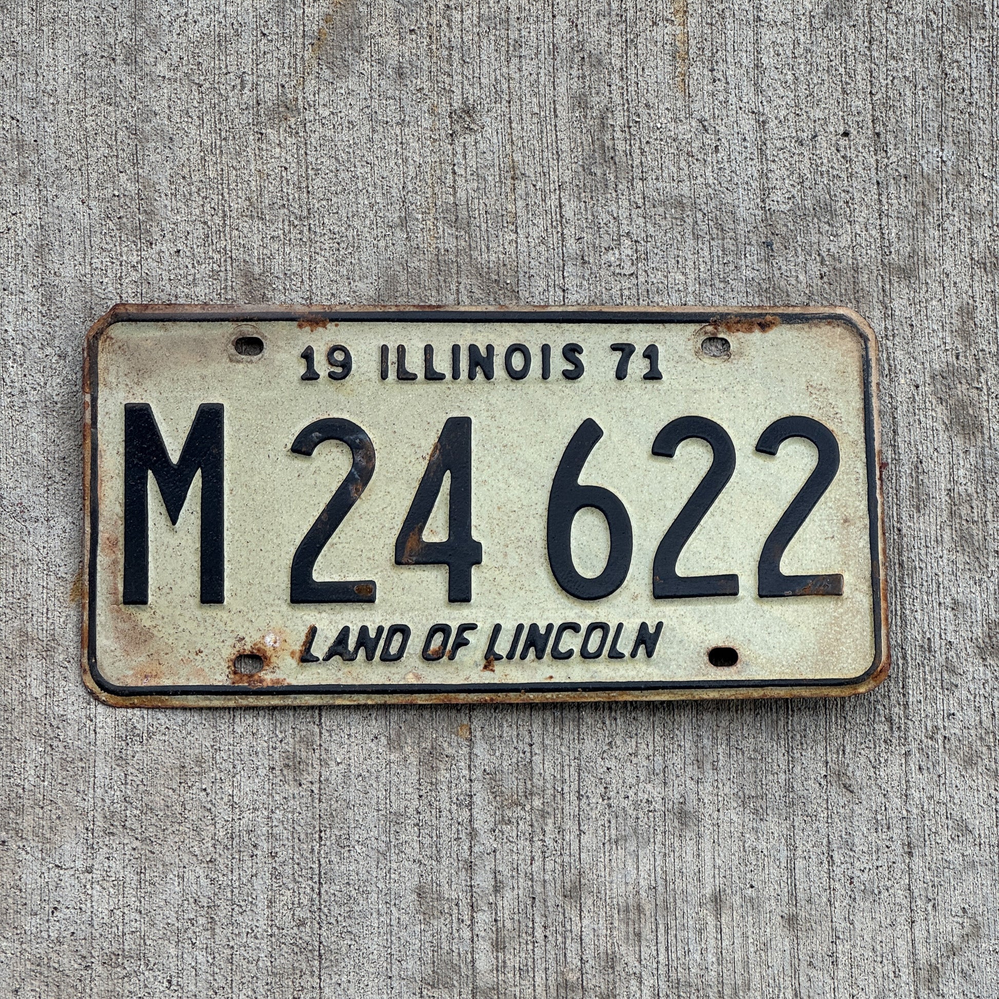 Photo of a 1971 Illinois Municipal License Plate Auto Tag 2 Vintage Garage M 24 622 with original patina