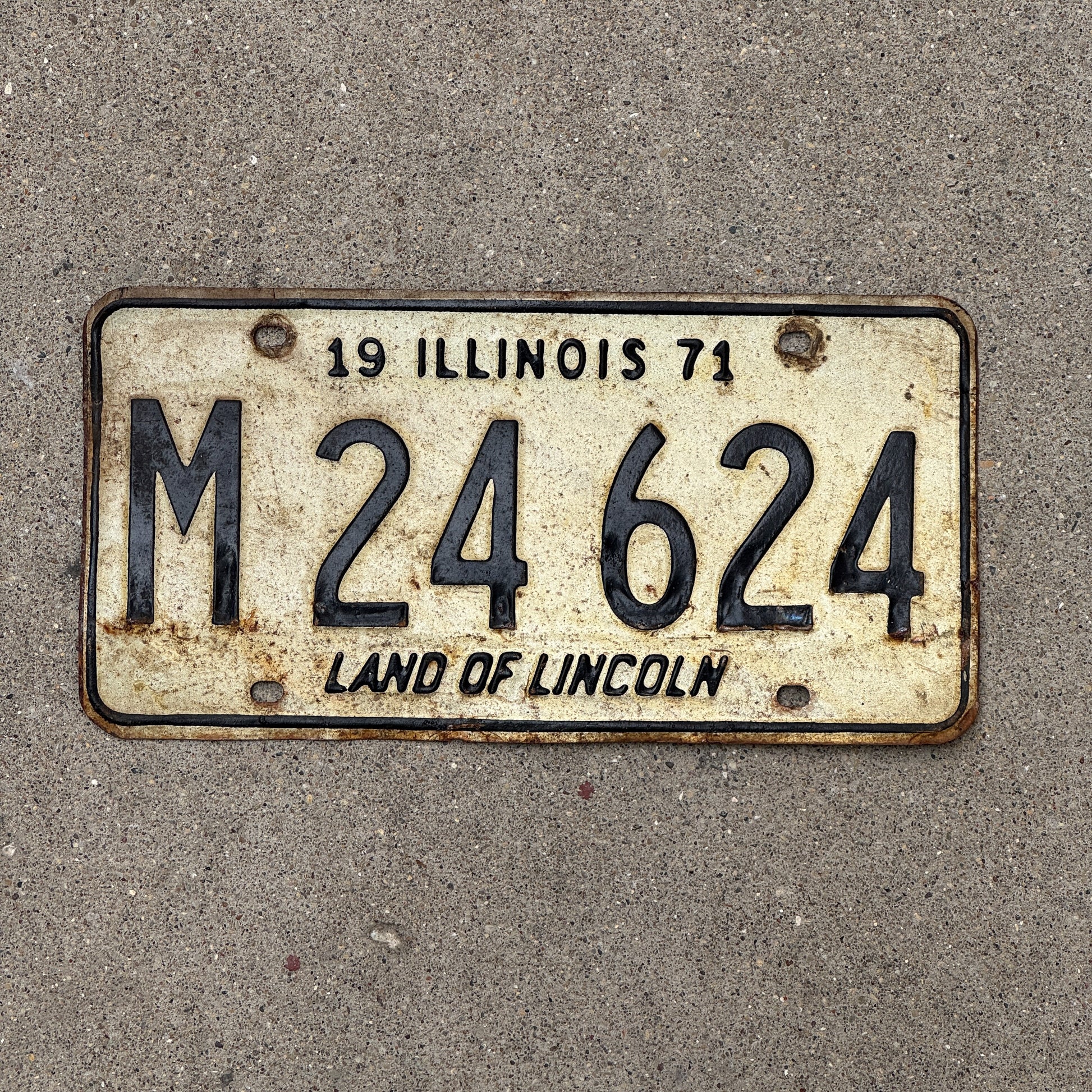 Photo of a 1971 Illinois Municipal License Plate Auto Tag 2 Vintage Garage M 24 624 with original patina