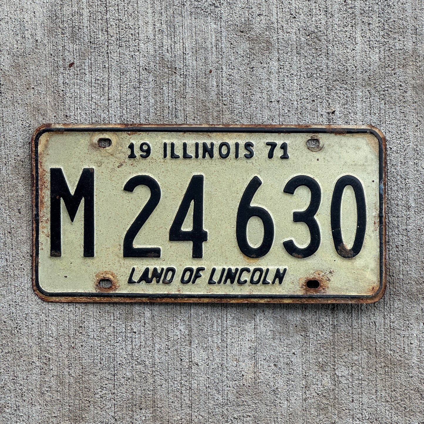 Photo of a 1971 Illinois Municipal License Plate Auto Tag 2 Vintage Garage M 24 630 with original patina