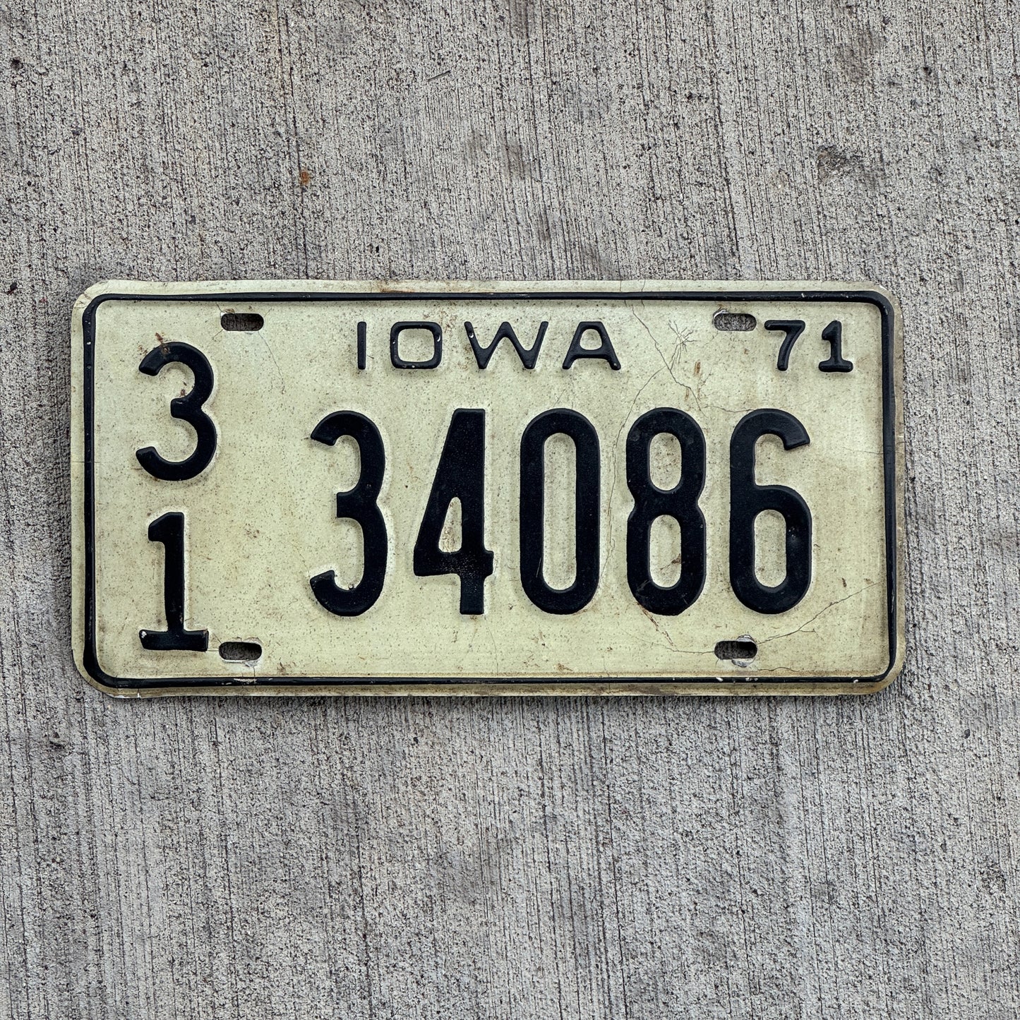 Photo of a 1971 Iowa License Plate Auto Tag Garage Decor Vintage 31 34086 with original patina