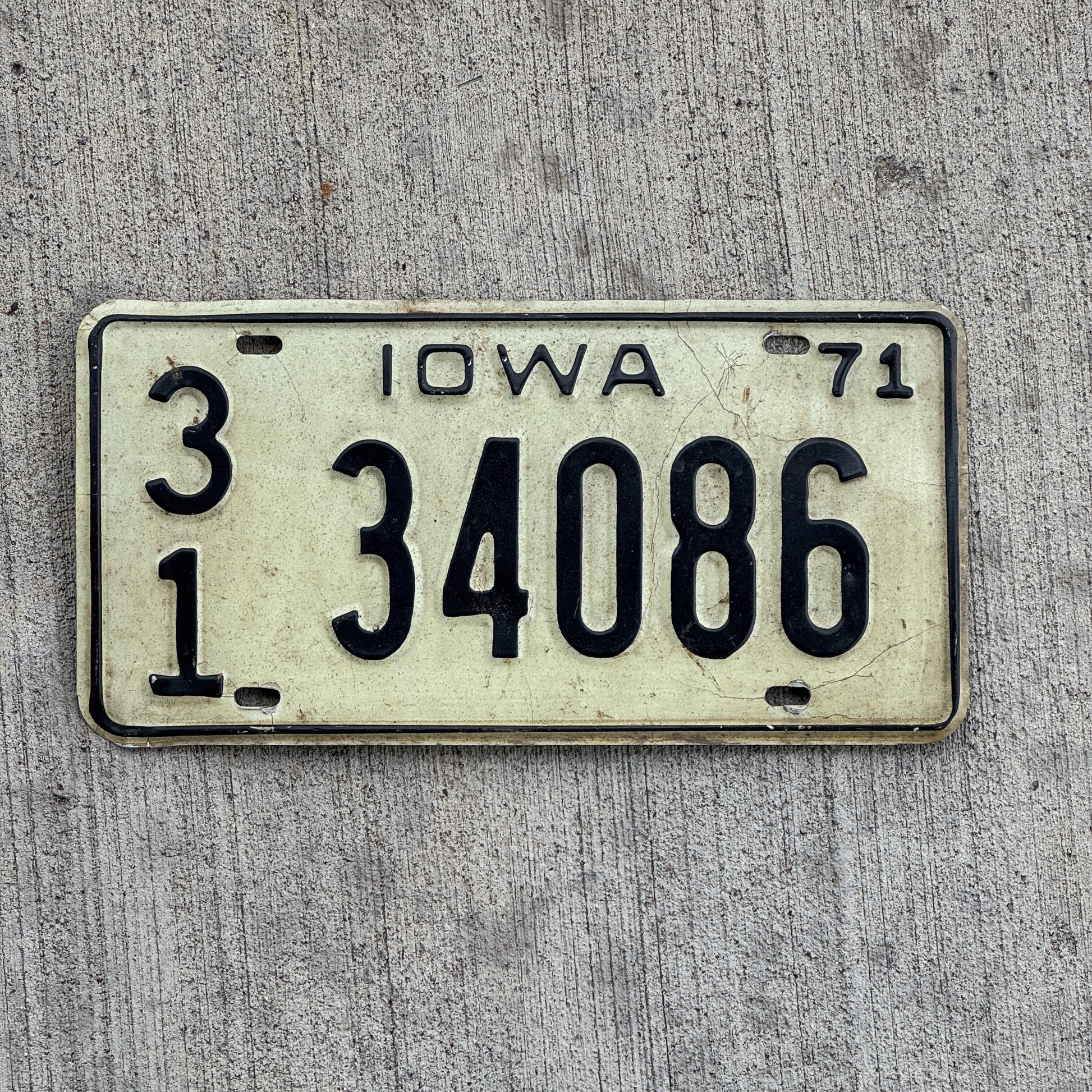 Photo of a 1971 Iowa License Plate Auto Tag Garage Decor Vintage 31 34086 with original patina