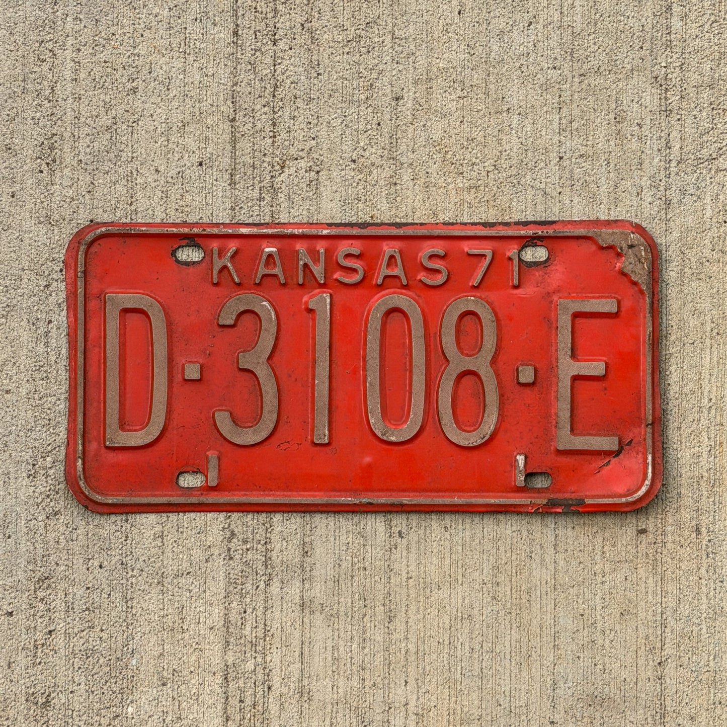 Photo of a 1971 Kansas Dealer License Plate Auto Tag Garage Decor Vintage D 3108 E with original patina