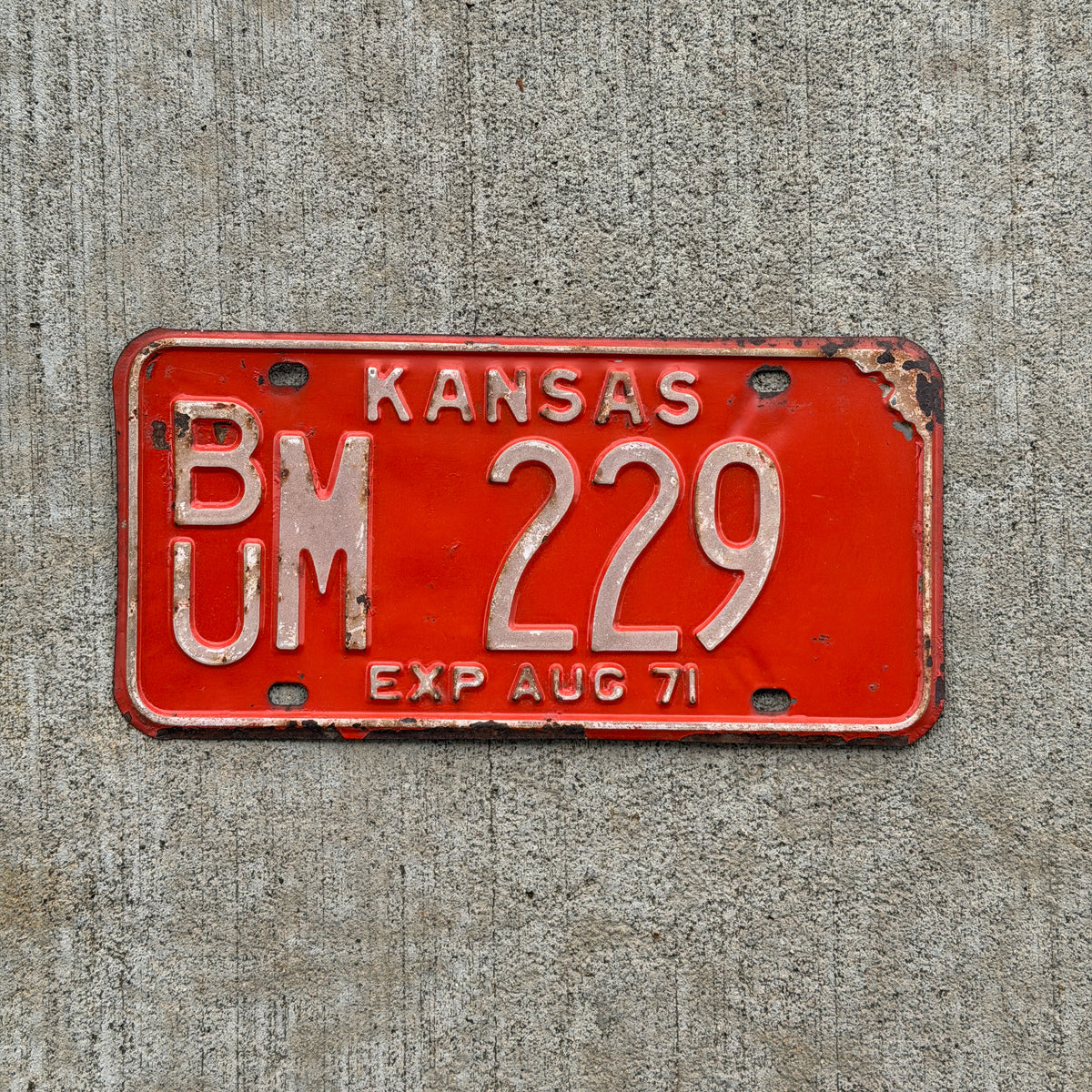 Photo of a 1971 Kansas License Plate Auto Tag Garage Decor Vintage BU M 229 with original patina