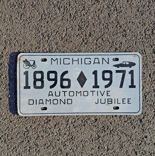 Photo of a 1971 Michigan Booster License Plate Auto Tag 1 Vintage Garage Automotive Diamond Jubilee Antique Auto 1896 with original patina