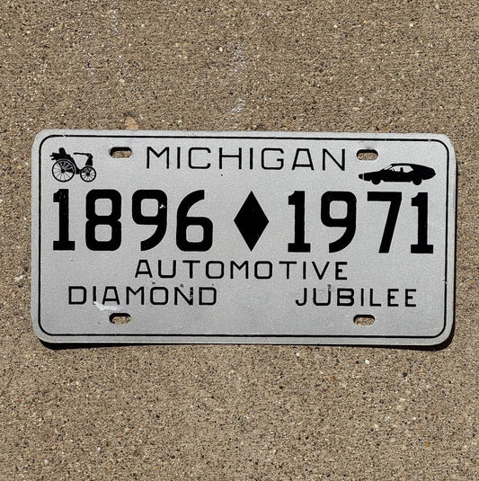 Photo of a 1971 Michigan Booster License Plate Auto Tag 2 Vintage Garage Automotive Diamond Jubilee Antique Auto 1896 with original patina