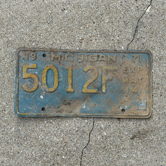 Photo of a 1971 Michigan Commercial License Plate Auto Tag Garage Decor Vintage Half Year 501 2F with original patina