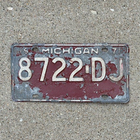 Photo of a 1971 Michigan Commercial License Plate Auto Tag Garage Decor Vintage Heavy Commercial 8722 DJ with original patina