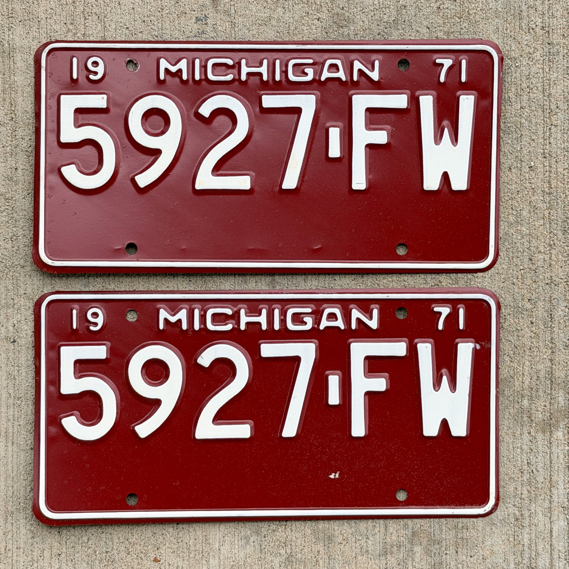Photo of a 1971 Michigan Commercial License Plate Pair Auto Tag Garage Decor Vintage 5927 FW with original patina
