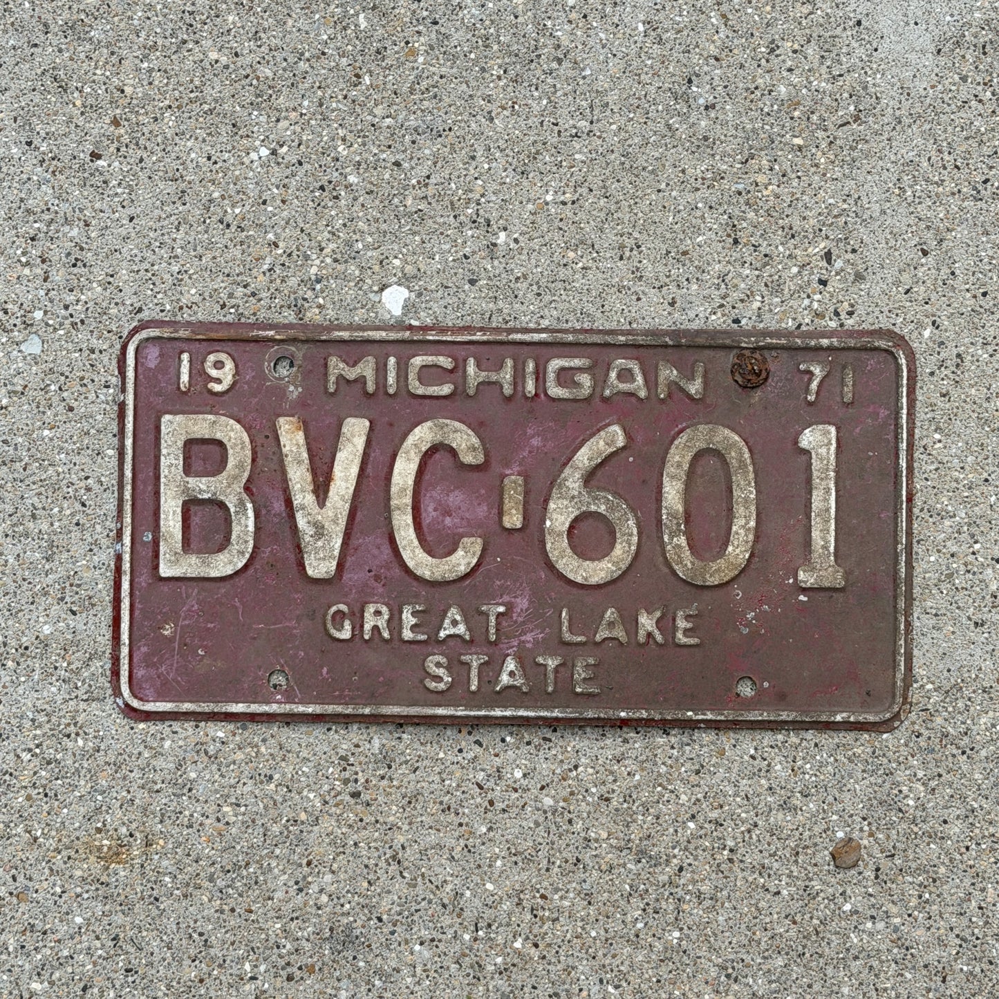 Photo of a 1971 Michigan License Plate Auto Tag Garage Decor Vintage BVC 601 with original patina