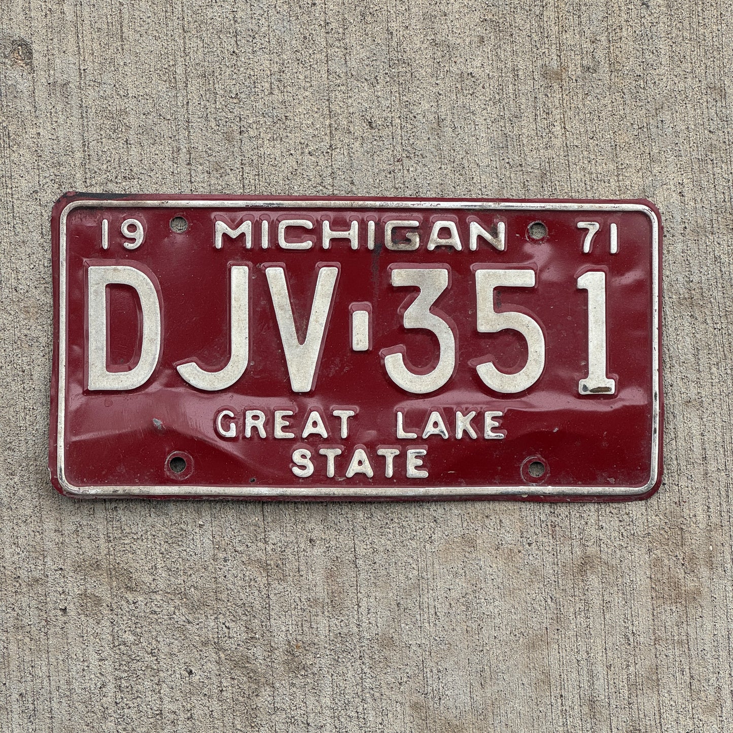 Photo of a 1971 Michigan License Plate Auto Tag Garage Decor Vintage DJV 351 with original patina