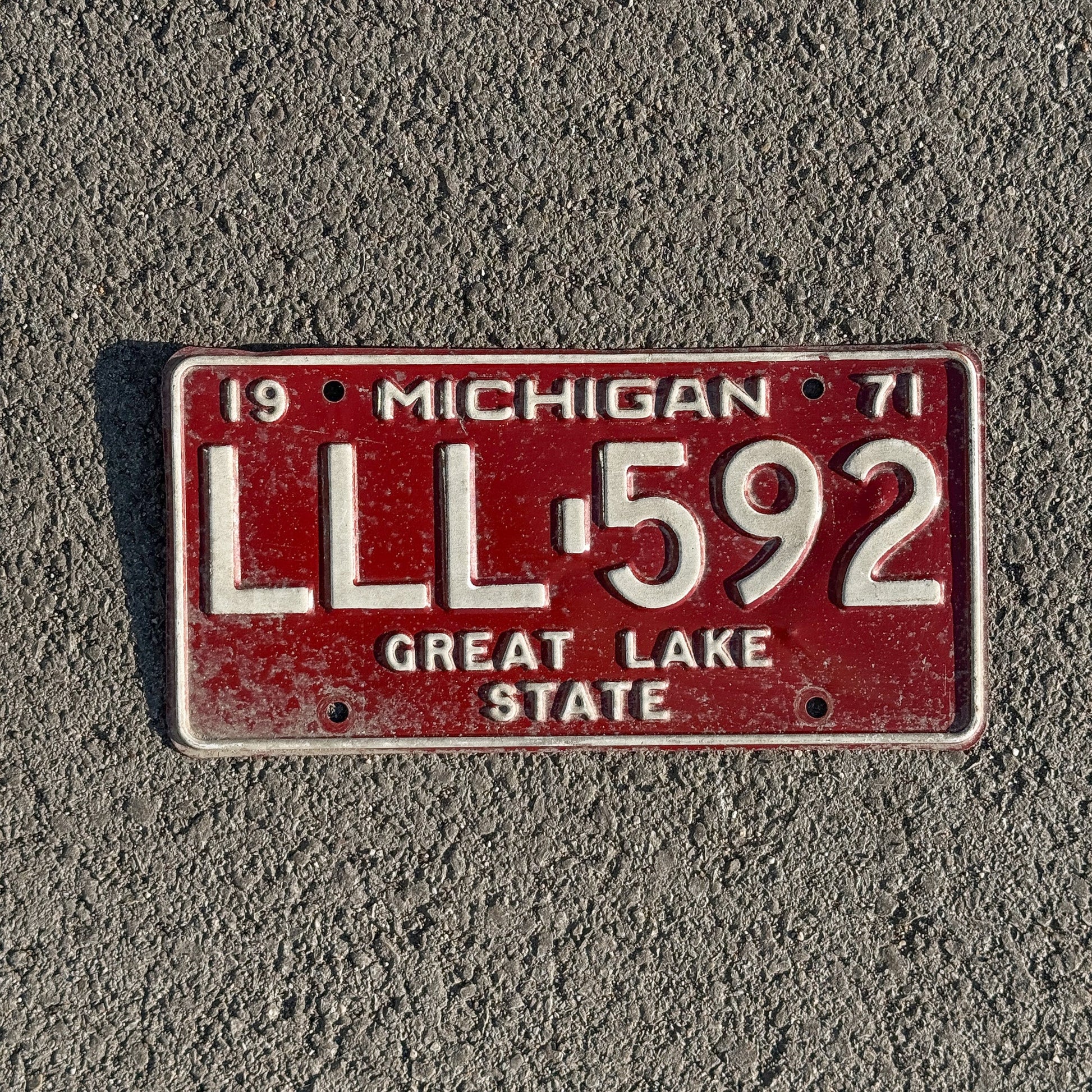 Photo of a 1971 Michigan License Plate Auto Tag Garage Decor Vintage Repeat Repeating LLL 592