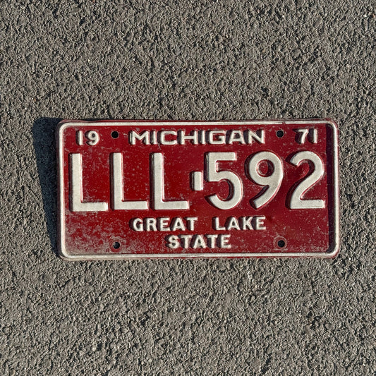 Photo of a 1971 Michigan License Plate Auto Tag Garage Decor Vintage Repeat Repeating LLL 592