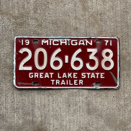 Photo of a 1971 Michigan Trailer License Plate Auto Tag Garage Decor Vintage 206 638 with original patina