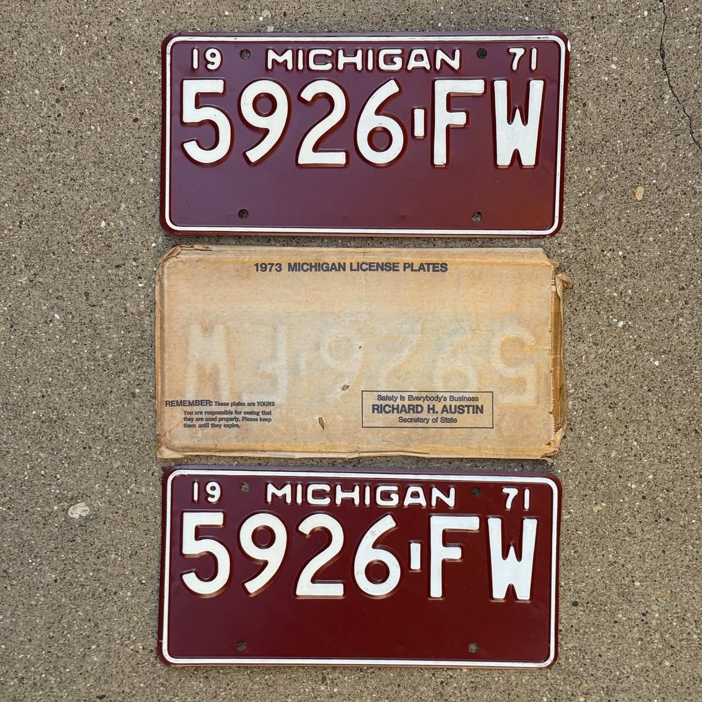 Photo of a 1971 Michigan Truck License Plate Pair Auto Tag Garage Decor Vintage NOS with envelope (non-matching) 5926 FW