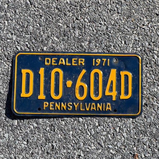 Photo of a 1971 Pennsylvania Dealer License Plate Auto Tag Garage Decor Vintage D10 604D