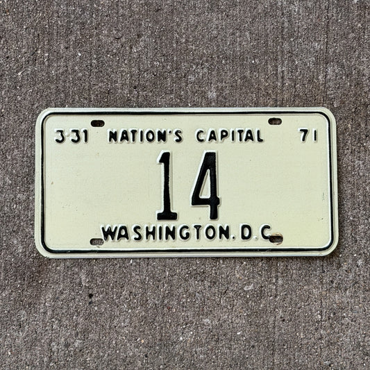 Photo of a 1971 Washington DC License Plate Auto Tag Garage Decor Vintage Low Number Two Digit 14 with original patina