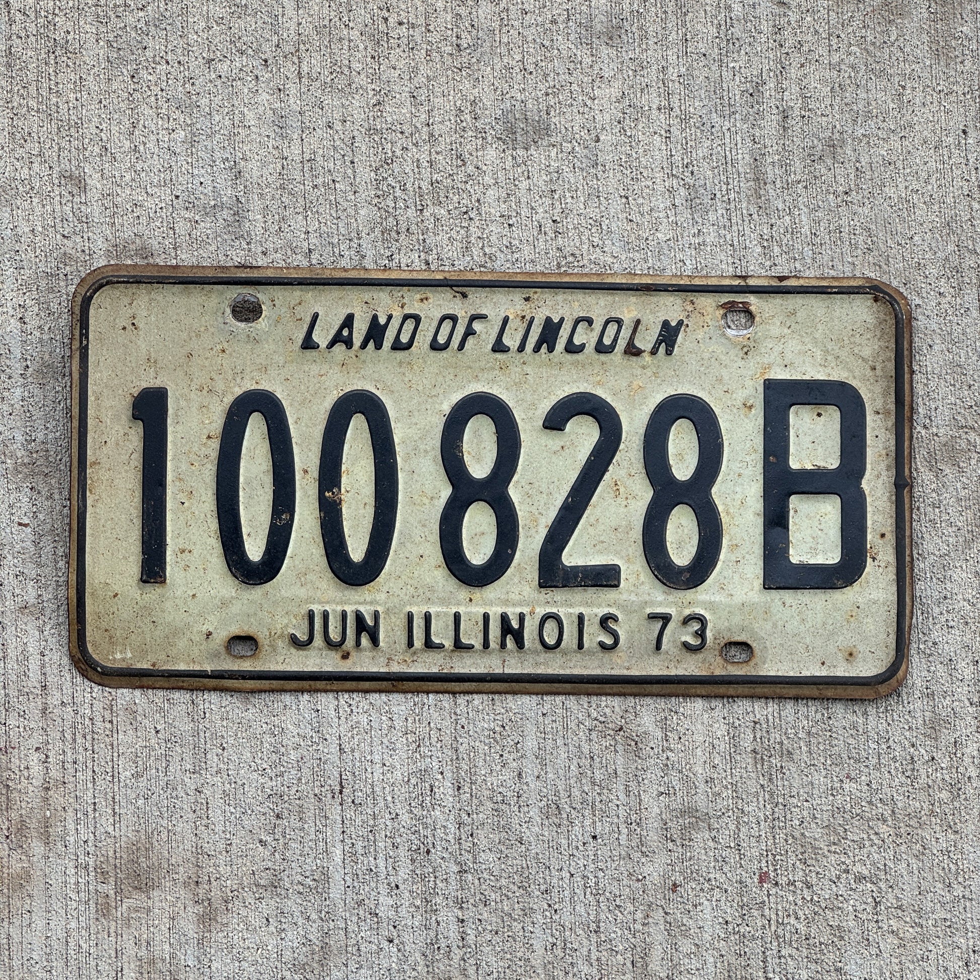 Photo of a 1972 1973 Illinois Truck License Plate Auto Tag Garage Decor Vintage 100 828 B with original patina