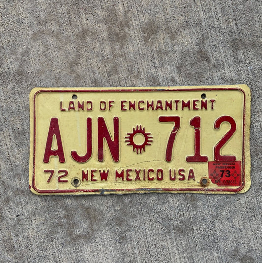 Photo of a 1972 1973 New Mexico License Plate Auto Tag Garage Decor Vintage AJN 712 with original patina