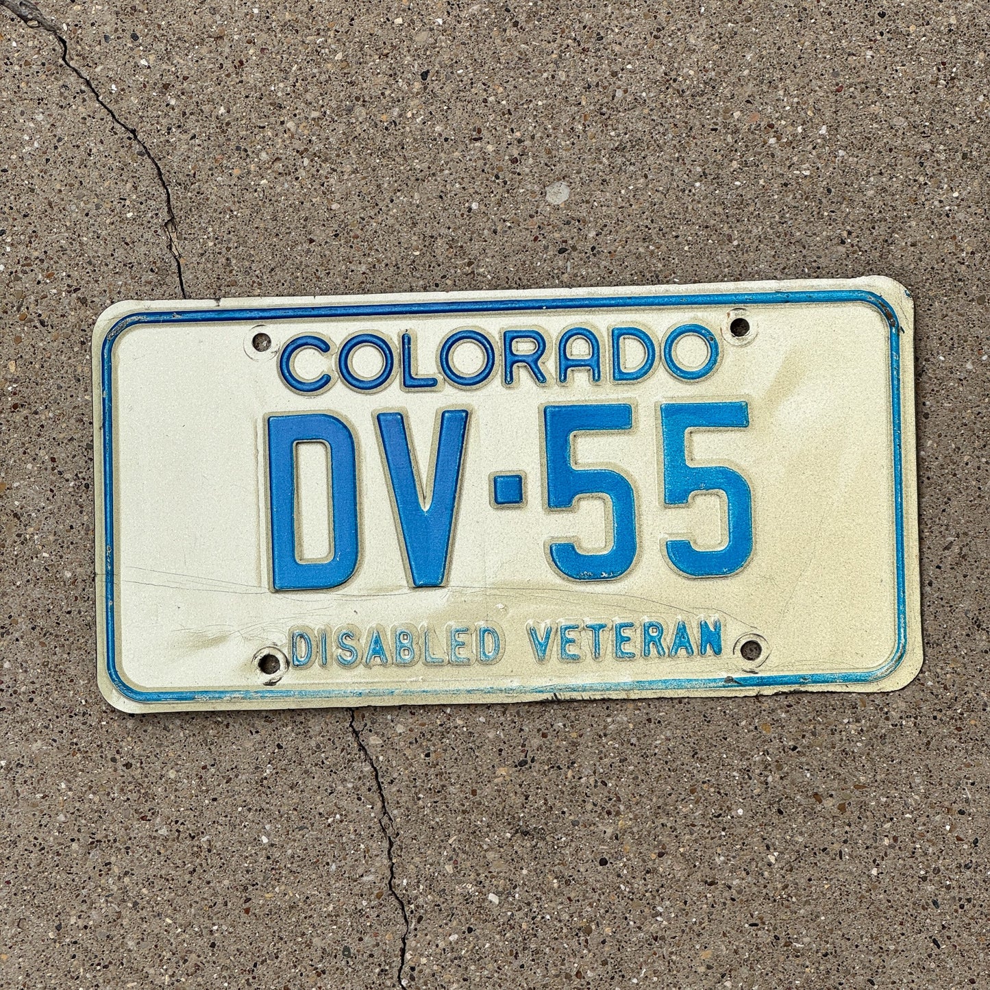 Photo of a 1972 Colorado Disabled Veteran License Plate Auto Tag Garage Decor Vintage DV 55