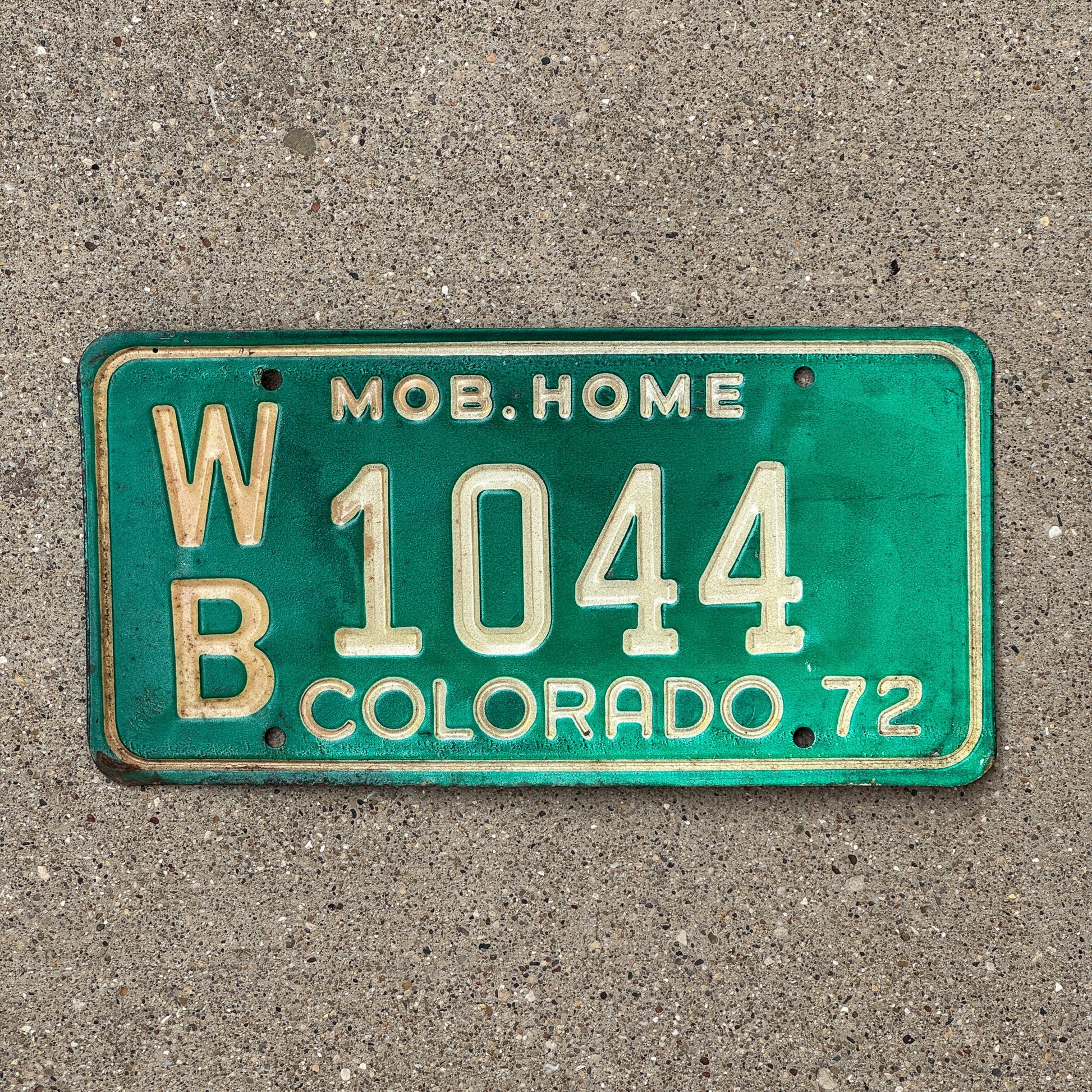 Photo of a 1972 Colorado Mobile Home License Plate Auto Tag Garage Decor Vintage WB 1044
