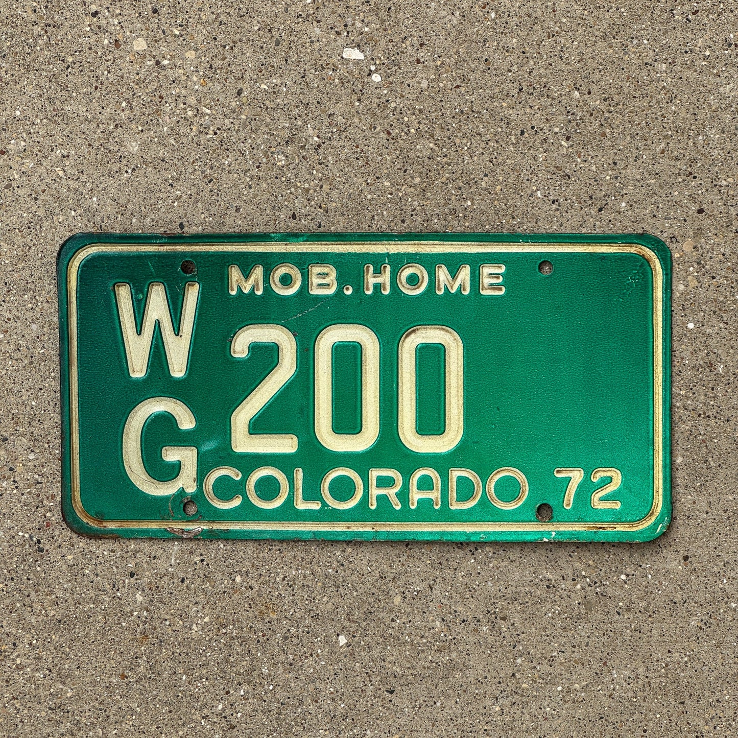 Photo of a 1972 Colorado Mobile Home License Plate Auto Tag Garage Decor Vintage WG 200
