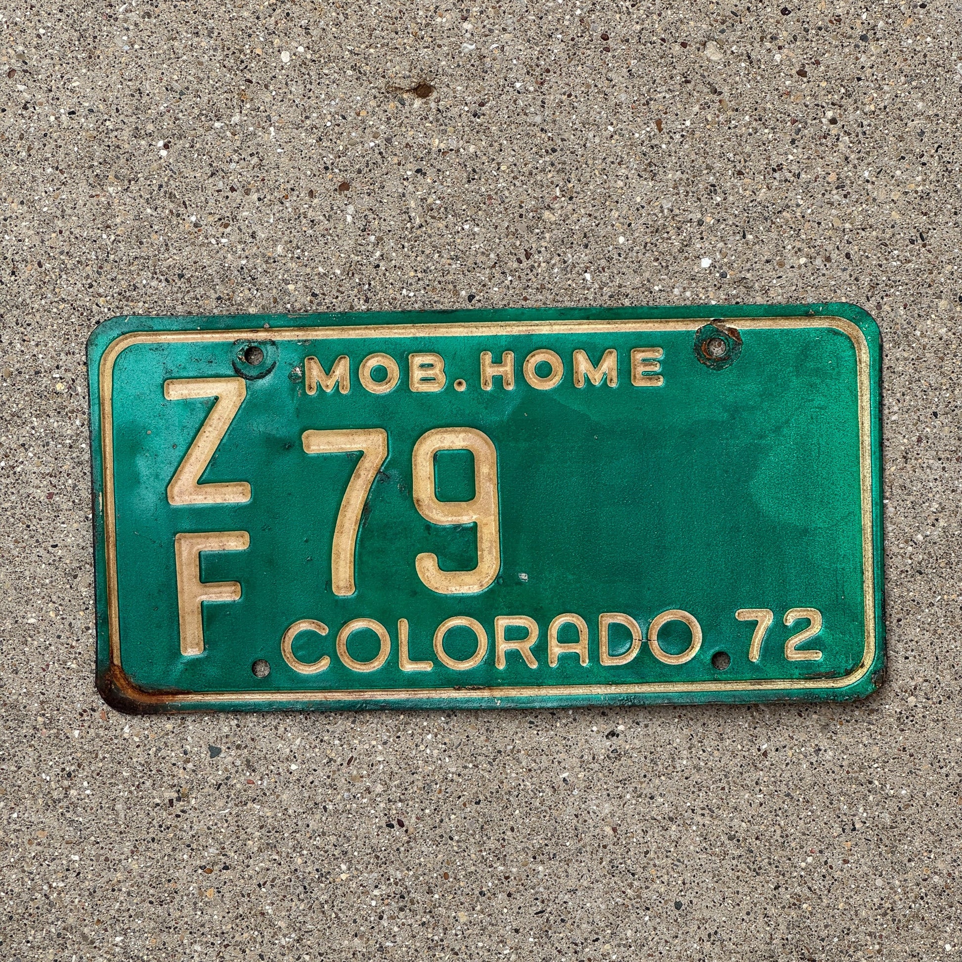 Photo of a 1972 Colorado Mobile Home License Plate Auto Tag Garage Decor Vintage ZF 79