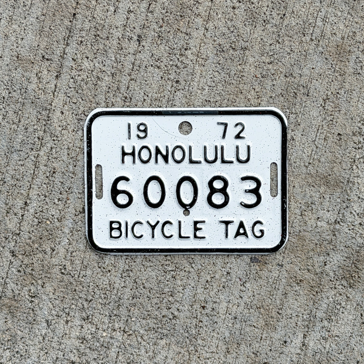 Photo of a 1972 Honolulu Hawaii Bicycle License Plate Auto Tag Garage Decor Vintage Bike 60083 with original patina
