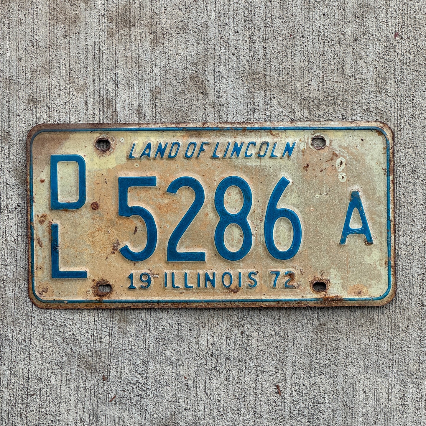 Photo of a 1972 Illinois Dealer License Plate Auto Tag 1 Vintage Garage 5286 A with original patina