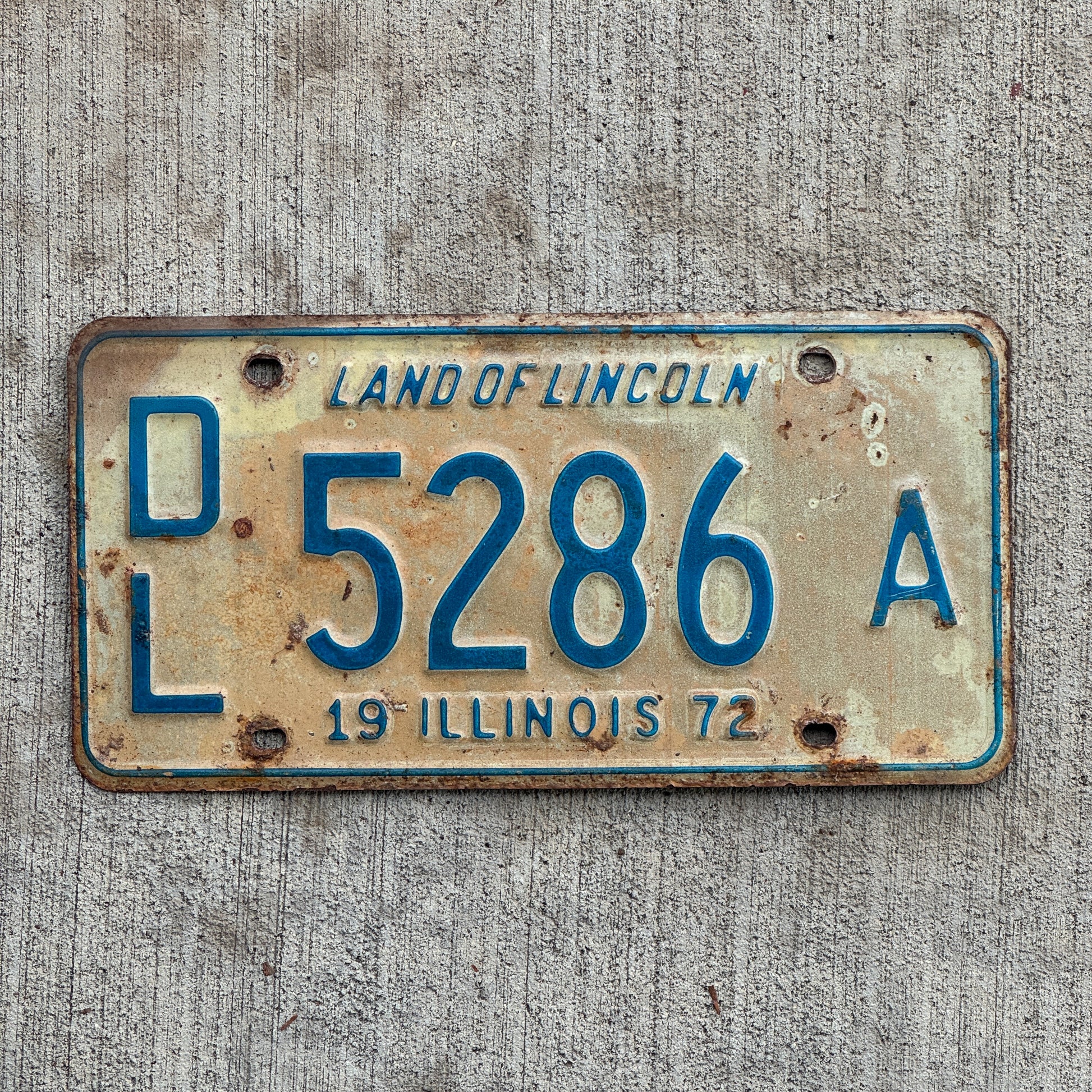 Photo of a 1972 Illinois Dealer License Plate Auto Tag 1 Vintage Garage 5286 A with original patina