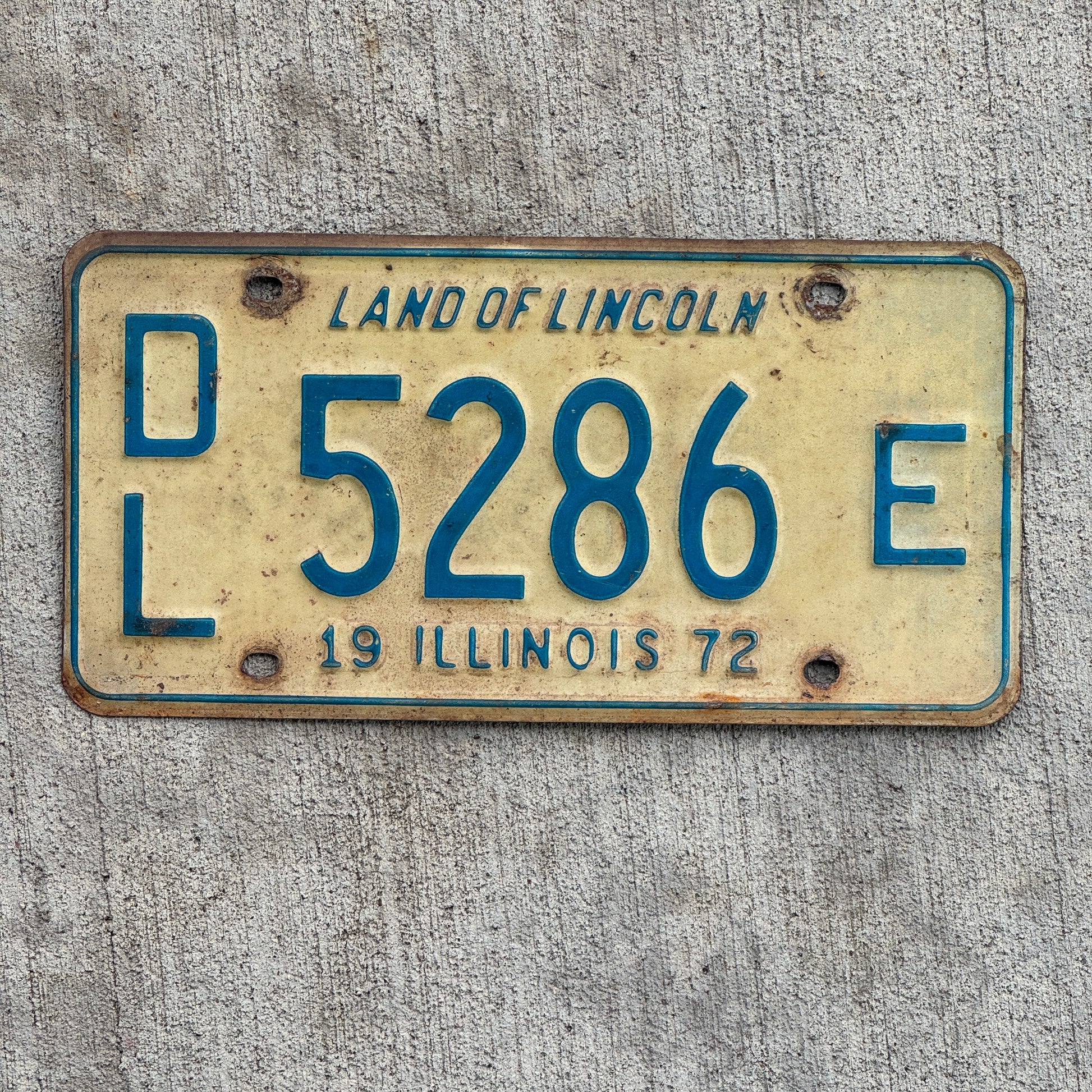 Photo of a 1972 Illinois Dealer License Plate Auto Tag 2 Vintage Garage 5286 E with original patina