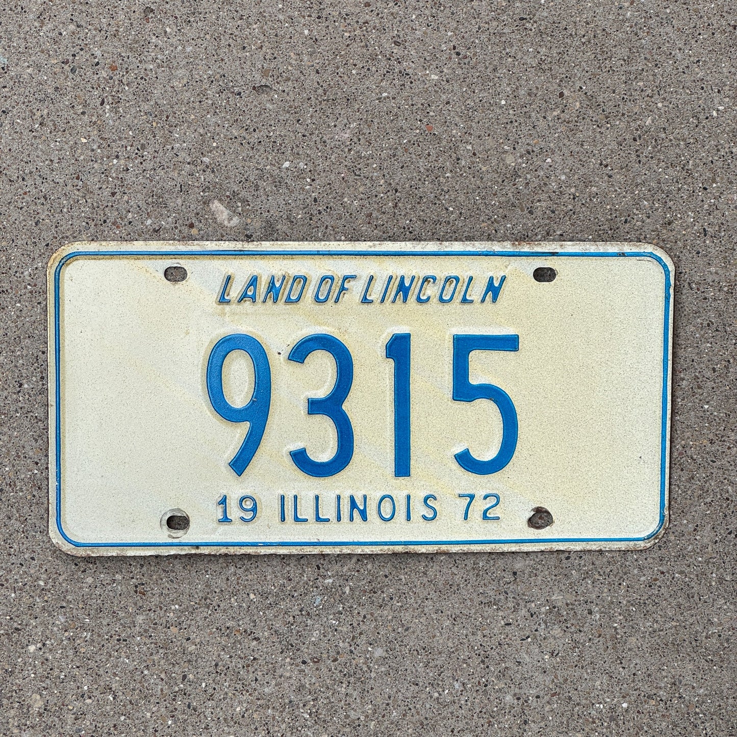 Photo of a 1972 Illinois License Plate Auto Tag Garage Decor Vintage Low Number Four Digit 9315 with original patina