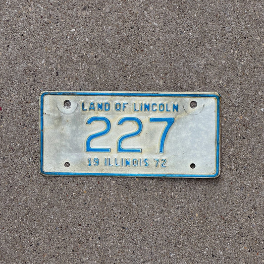 Photo of a 1972 Illinois Motorcycle License Plate Auto Tag Garage Decor Vintage Low Number Three Digit 227 with original patina
